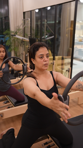 Small-group Pilates class at J Pilates Ghansoli