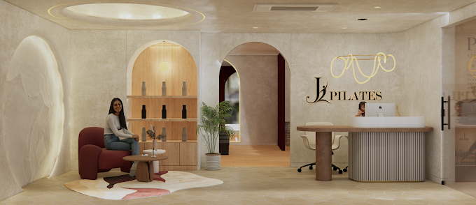 J Pilates reception lounge with studio branding and seating