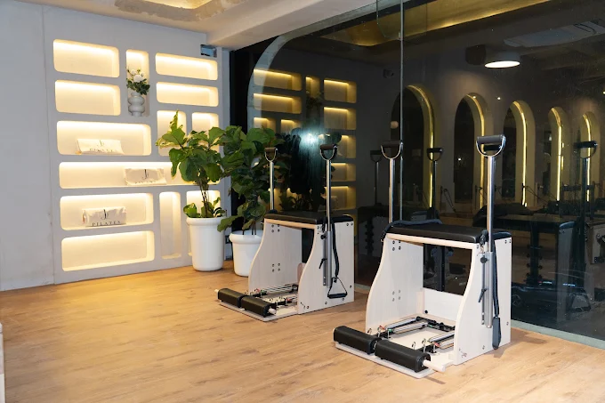 Wunda chairs and branded towels at J Pilates Sanpada