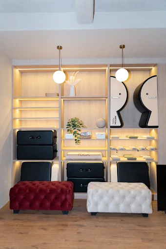 Storage wall and ottomans at J Pilates Sanpada